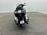 a motorcycle that is parked in the middle of a circle