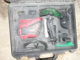 a case with tools in it sitting on the floor