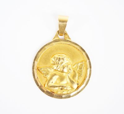 an image of a gold pendant with an angel on it
