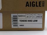 an image of a pair of shoes sitting on top of a box