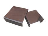 two pieces of wood are stacked on top of each other
