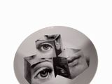 an image of a plate with a picture of a person ' s eyes