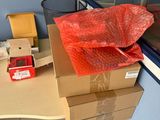 a pile of boxes sitting on top of a table