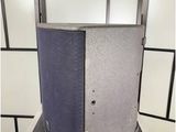 a speaker that is sitting on top of a table