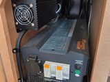 an image of a power invertor inside of a box