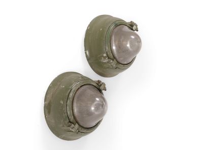 pair of olive green military helmet stud earrings on a white background