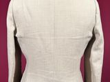 the back of a suit on a mannequin mannequin mannequin mannequin mannequin mannequin mannequin mannequin mann