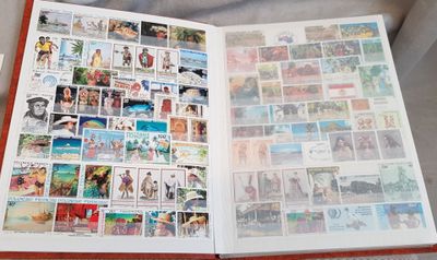 an open book with pictures of people and animals on it