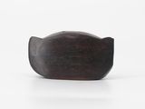 wooden cat figurine on a white background