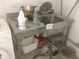 an image of a kitchen with a washer and dryer in it