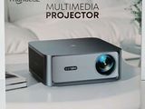 a box that has a projector in it on a table