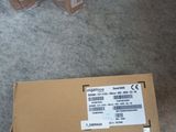 a box of boxes sitting on the floor next to a pile of boxes