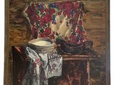 tableau à l'huile encadré représentant un bol de lait et une paire de bottes de cow-boy posés sur une chaise