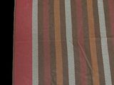 an image of a brown and red plaid blanket on a black background