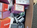a box full of electronic devices sitting on the ground
