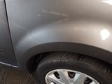 a close up of a car ' s tire on the floor