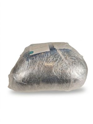 a bag of fish wrapped in plastic on a white surface