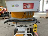 a close up of a machine on a pallet in a warehouse