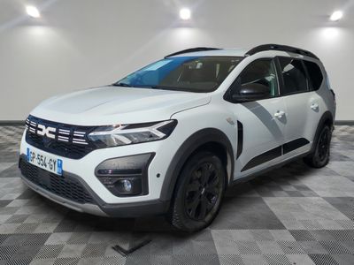 the white suv is parked in a room with a checkered floor