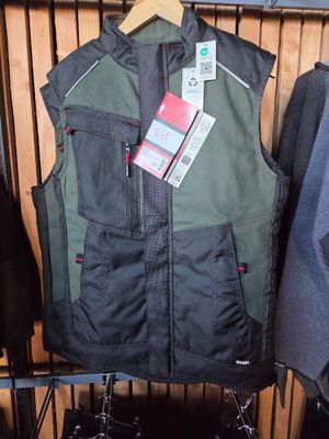 two jackets hanging on a rack in a store
