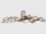 a pile of coins sitting on top of each other