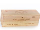 a wooden box with a label on it that says chateau haut - brion
