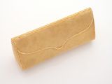 beige clutch bag on a white background
