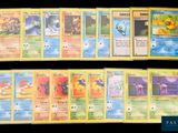 the pokemon cards are lined up and ready to be played