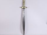 a close up of a knife on a white surface with a white background