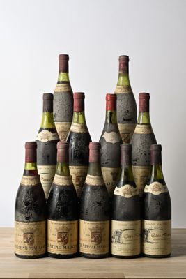 several bottles of wine sitting on top of a wooden table