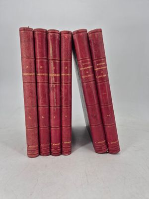 six red books stacked on top of each other on a white surface