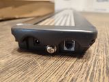 a close up of a cell phone sitting on a table