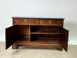 a wooden cabinet with two drawers and a marble top