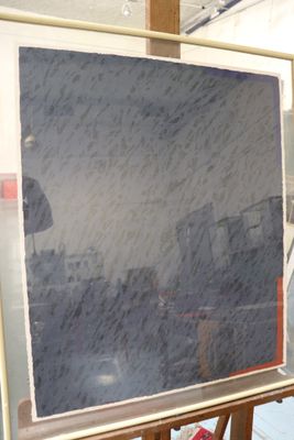 a picture of a painting on a easel in a room