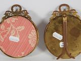 pair of antique brass picture frames with pink and white floral designs