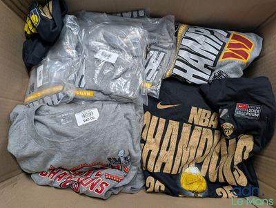 a box full of t - shirts and other items that are in it