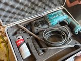 a box with tools in it sitting on a table