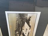 a picture of a picture of a man in a hat on a table
