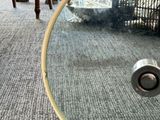 a mirror that is sitting on the floor in the living room