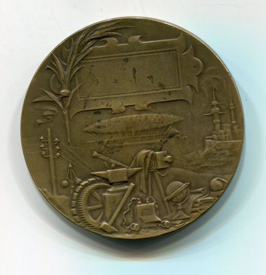 une médaille d'or sur laquelle figure l'image d'un homme à vélo