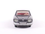 a toy car that is sitting on a white surface