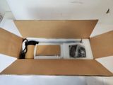 a cardboard box with a phone inside of it