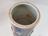 a vase that is sitting on a white table