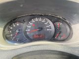 a close up of a car dashboard with a speedometer