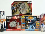 several star wars action figures are displayed in a display case