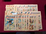 beaucoup de bandes dessinées posées sur une table recouverte d'une nappe rouge