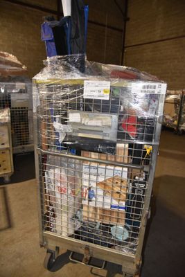 a metal cart with many items in it in a warehouse