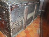 an old trunk sitting on the floor in a room