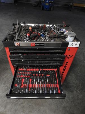 a tool box that has many tools in it