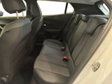 the back seat of a car with a bottle in it